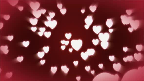 Abstract red hearts on dark background.