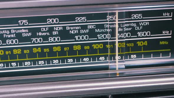 Tuning Analog Radio Dial Frequency on Scale of the Vintage Receiver alt