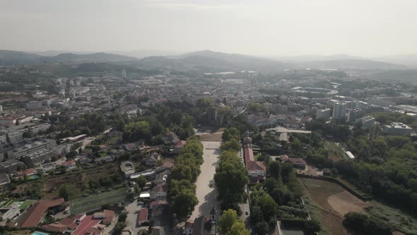 Aerial view of Castle of Guimaraes historic european landmark, pull in shot