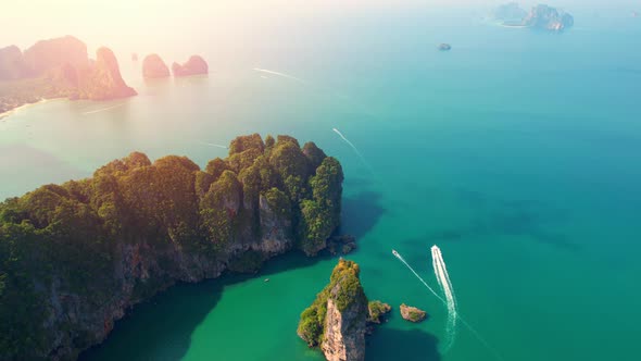 4K aerial view of the beautiful mountain coast of the tropical sea alt