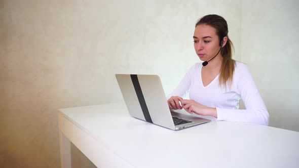 Young Woman Using Laptop to Be Interviewed by HR Manager