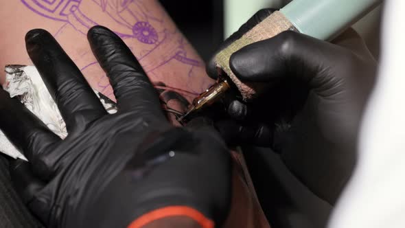 Close Up Macro View of Tattooing Process alt