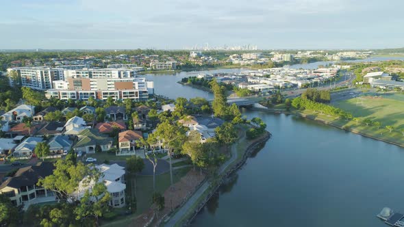 Slow Descend Over Varsity Lakes Suburb and Reedy Creek at Sunset