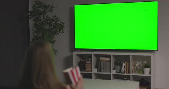 Woman Watching Green Screen TV