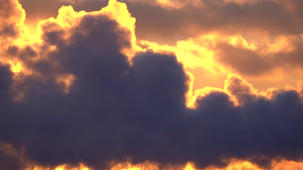 Smoke from chimneys on a frosty winter evening in the contoured light of the sun alt