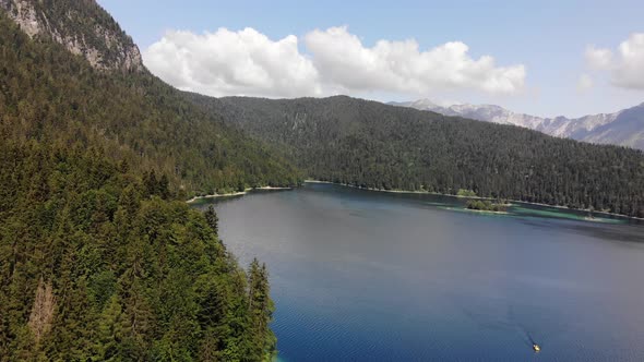 beautiful drone video of an lake and mountains, eibsee in bavaria alt