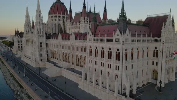 The sun sets on the Hungarian Parliament Building alt
