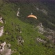Paraglider Flies Over the Surface of the Earth in the Mountains of Crimea - VideoHive Item for Sale