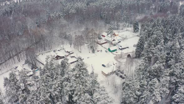 Winter Landscape of a Russian Village in the Forest