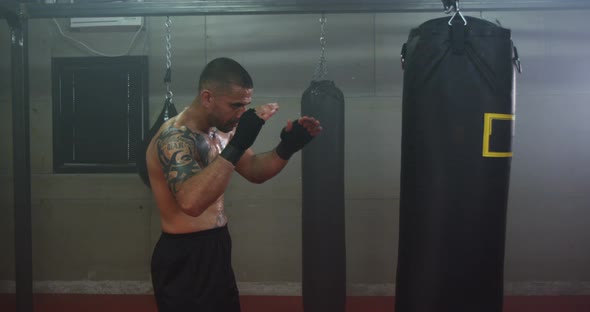 Boxer Hits Punching Bag 37b