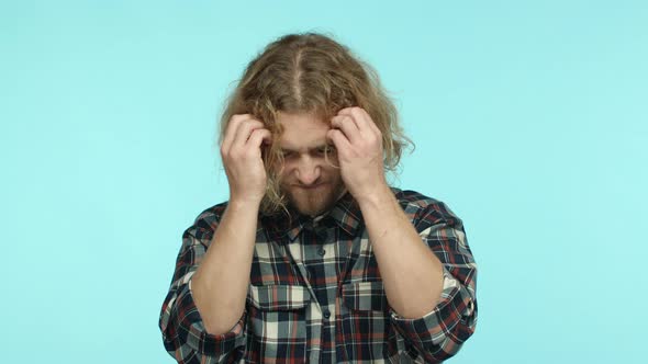 Angry or Annoyed Blond Bearded Man Losing Patience Showing Head Exlosion Gesture Mind Blowing