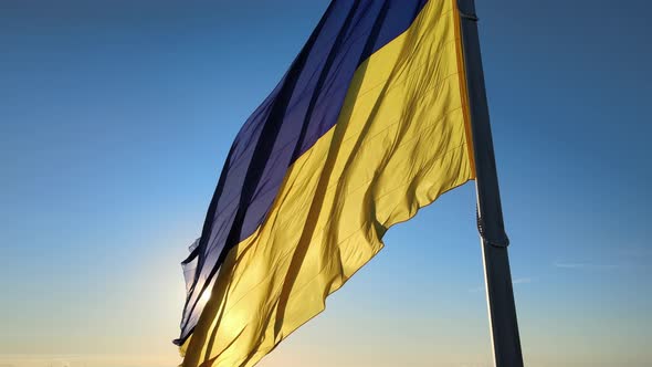 Ukrainian Flag in the Morning at Dawn. Aerial. Kyiv. Ukraine alt