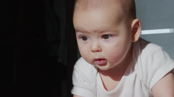 Portrait of Cute Little Baby Girl Laughing alt