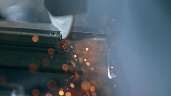 Super Slow Motion Detail Shot of Cutting Iron with Circular Saw at 1000 Fps alt