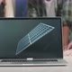 Laptop Showing Solar Cell While Engineers Group Discussing About Work On The Blueprint At The Office - VideoHive Item for Sale