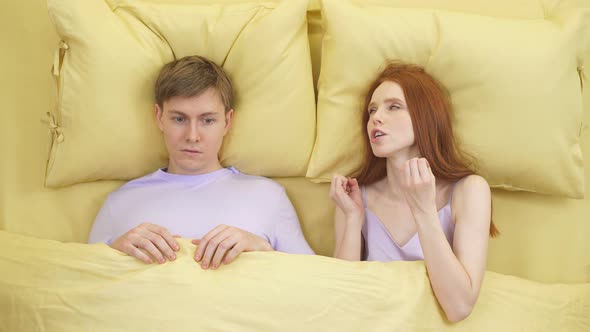 People Relationship Difficulties and Family Concept Unhappy Couple Having Conflict in Bed at Home