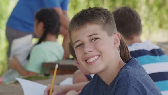Portrait of boy at outdoor school