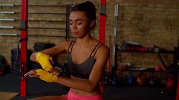 Determined Sporty Fit African American Woman Boxer Preparing for Fight alt