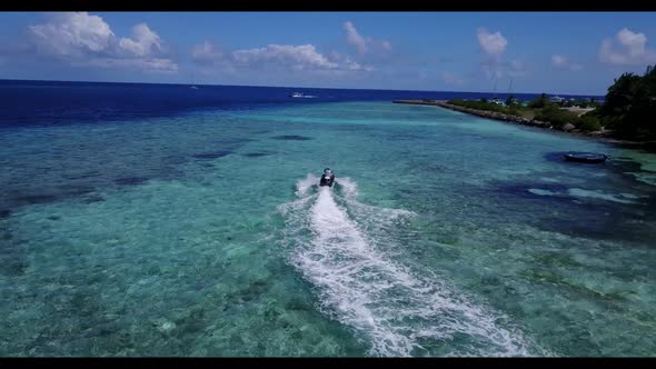 Aerial landscape of paradise lagoon beach vacation by clear ocean with white sand background of adve alt