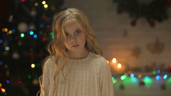 Little Lonely Girl Asking for Help Holding Out Hand alt