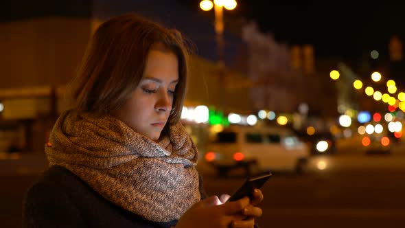 Midnight Girl Uses A Smart Phone 4 alt