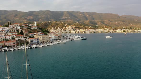 Aerial View of Poros Old Town and Marina or Seaport Greece  Drone Videography alt
