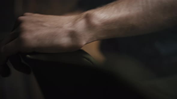 Unrecognizable Craftsman Cutting Seams on Canvas Product Preparing Garment for Reuse Close Up Shot alt