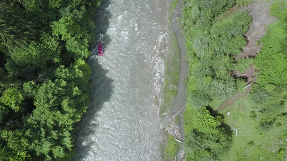Areial View of Group of People on a Rafting Trip in an Rubber Dinghy alt