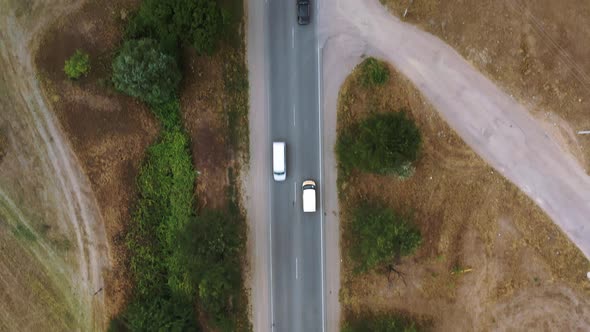 Aerial Drone Shot Flying Over Cars Moving on the Road Lanes