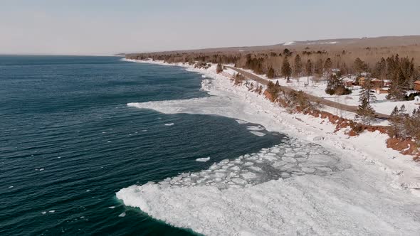 Icy-cold Water Of Lake Superior With Ice Starting To Melt On Later Part Of Winter In Duluth, Minneso alt