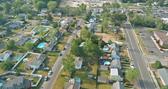 Small American Town District with Houses and Roads on Aerial View alt