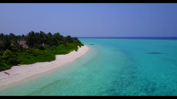 Aerial top view scenery of perfect seashore beach journey by blue green ocean with white sand backgr alt