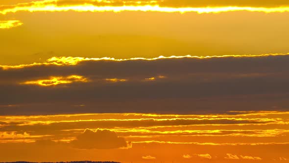 Majestic Timelapse of Dramatic Red Sunset Sky Over the Horizon. Amazing Sunset alt