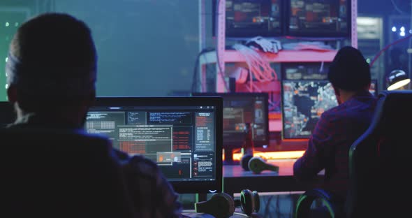 Hacker Team Working in a Basement, Stock Footage | VideoHive