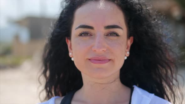 Close-Up Portrait of European Beautiful Cute Brunette Young Woman or Cheerful Girl Looking alt