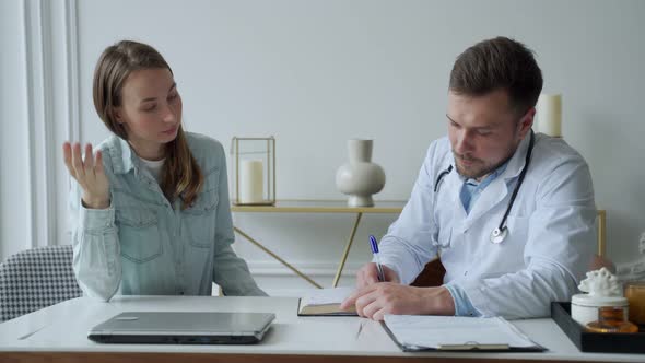 Therapist Doctor Man Talking to Patient alt