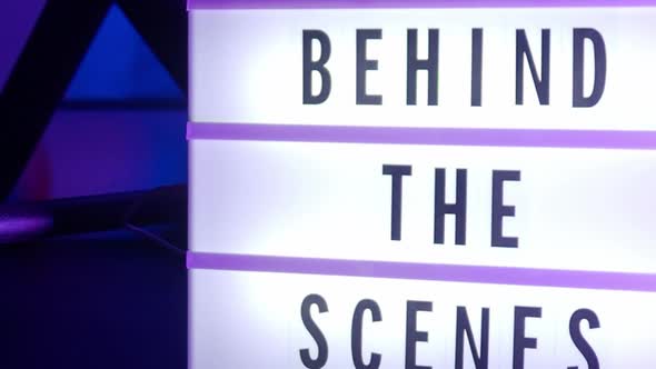 Behind the scenes lightbox in studio. letterboard text lightbox. Color light changing.