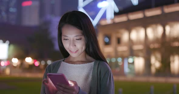 Woman use of mobile phone alt