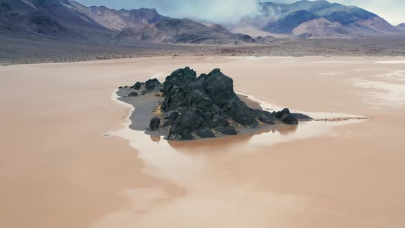 Scenic Black Rocks in Race Track Playa, Cinematic  Aerial of Desert Landscape alt