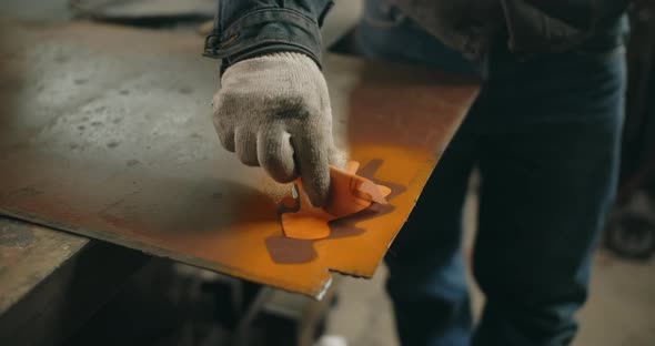 Locksmith Removes Stencil From Metal Surface After Painting By Spray Can in Slow Motion Painting at alt