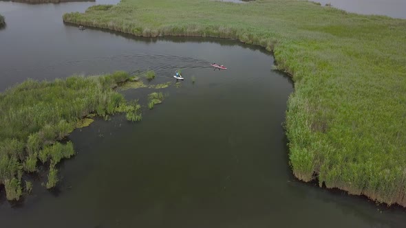 Kayak and Sup Sailing on the River alt