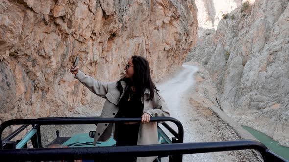 Traveler Woman In Canyon Enjoying Nature alt