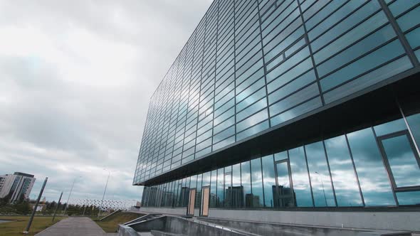 Motion Past Highrise Office Building at Construction Site alt
