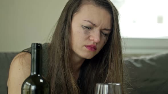 Crying Woman Drinking Alcohol Alone