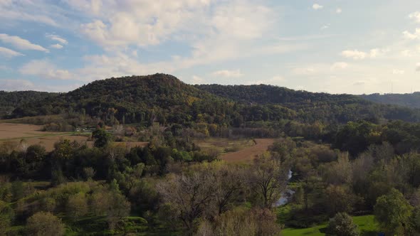 aerial view of harvested farm field and mountain in western Wisconsin in autumn.