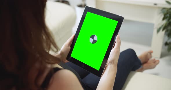 Woman Holding Tablet Chromakey Indoors