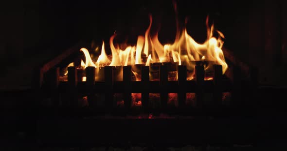 Fire burning in a fireplace 4k alt