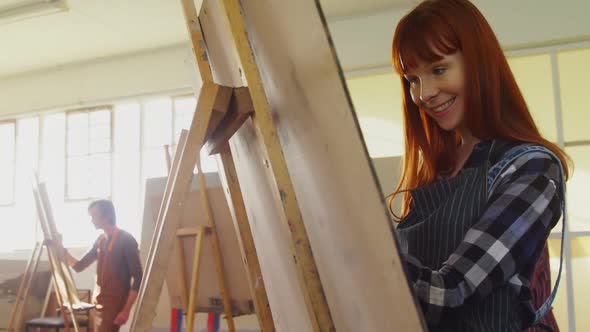 Woman drawing sketch on canvas 4k alt