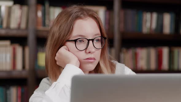 Emotional Young Girl Looking at Laptop Screen Reading Email with Unexpected Amazing News Celebrating alt