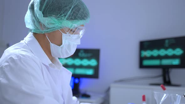 Coronavirus COVID vaccine researched by pharmaceutical bio research and development scientist team. alt